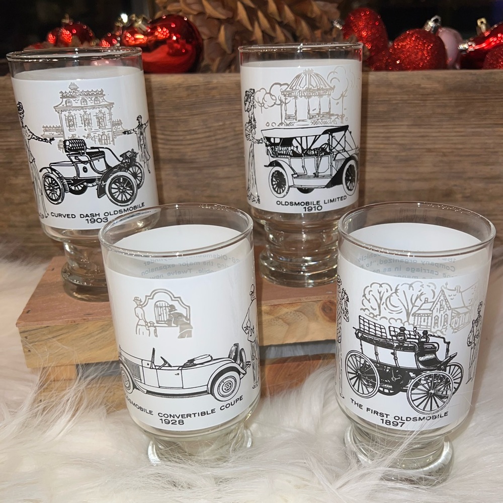 Set of 4 Oldsmobile footed drinking glasses